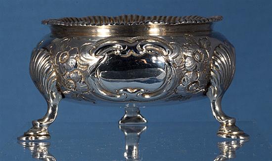 A set of four Victorian embossed silver table salts, by Roberts & Briggs, height 47mm, weight 12.8oz/401grms.